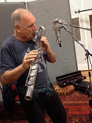 Dave Heath on bass flute during <i>U.N.C.L.E.</i> session. (photo courtesy of Daniel Pemberton)