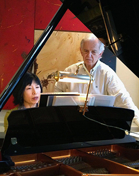 Gloria Cheng rehearsing with Bruce Broughton