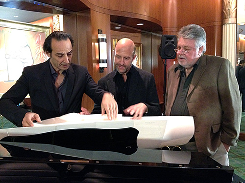 Alexandre Desplat, pianist Randy Kerber, and SCL President Ashley Irwin review excerpts from Desplat's scores. (Photo by Marilee Bradford)