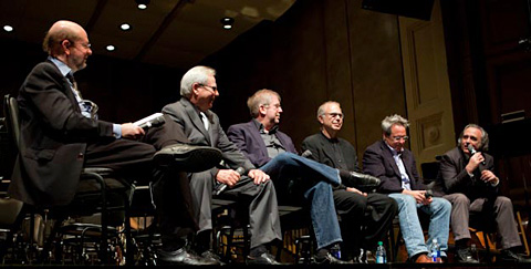 (Left to right) Moderator Jon Burlingame, music editor Kenneth Hall, agent Richard Kraft, music mixer Bruce Botnick, and film directors David Anspaugh and Joe Dante in a panel discussion during the Goldsmith Project afternoon symposium sponsored by The Film Music Society. (Photo by Philip Holahan.)