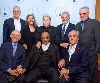 From left to right: (seated) Alan Bergman, Quincy Jones, Michel Legrand; (standing) James Newton Howard, Patti Austin, Marilyn Bergman, Sid Ganis and Dave Grusin. (Photo credit: Todd Wawrychuk / ©A.M.P.A.S.)